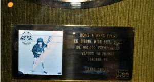 AC/DC Gold LP Auction Ends; Aussie Soccer Team Hawaii-Bound