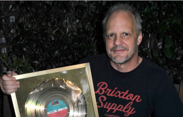 Bassist Mark Evans Auctions AC/DC Gold Record For Sydney Soccer Team